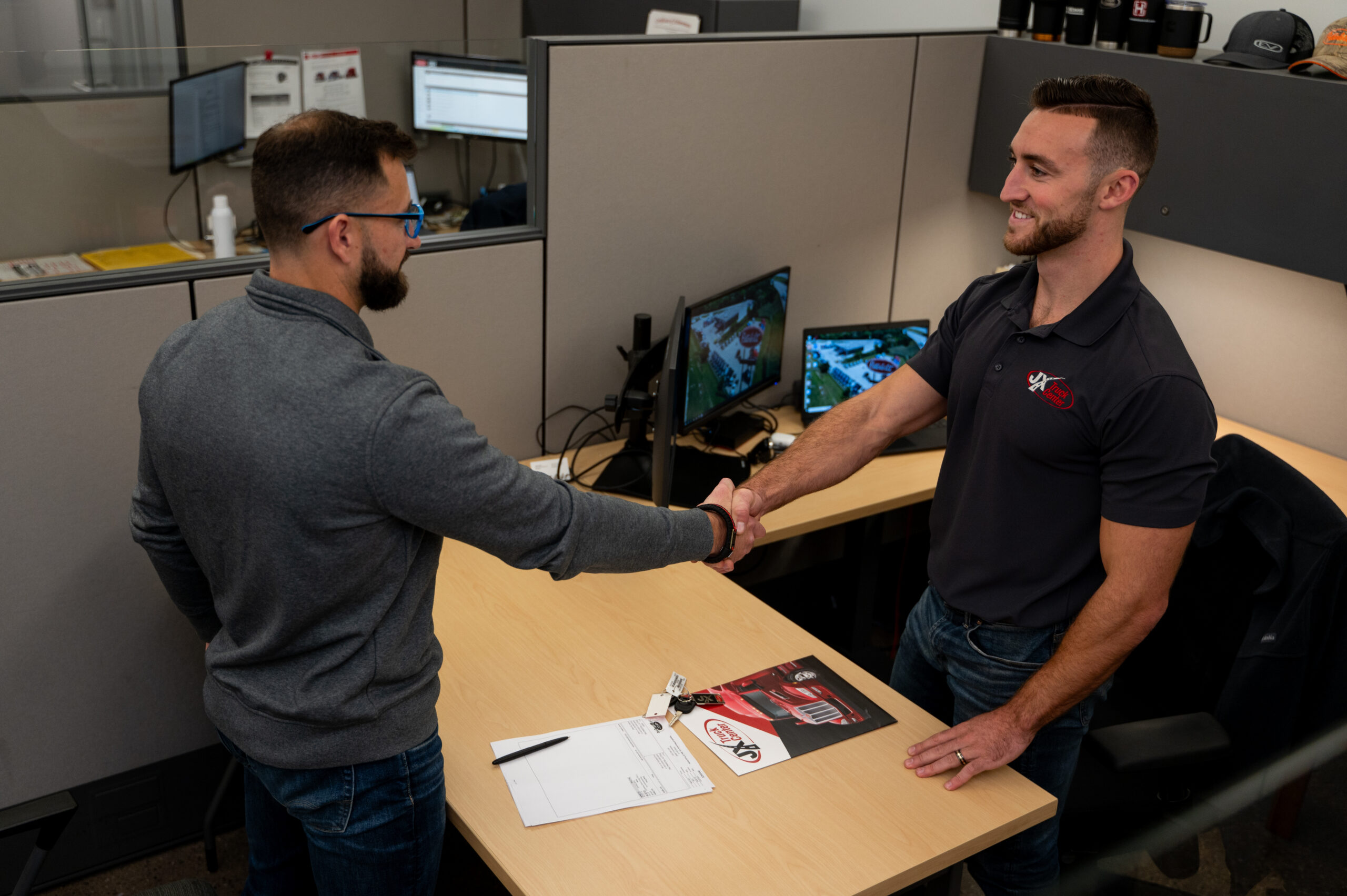 Customer signing truck deal