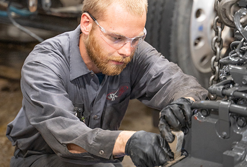Mechanic working on an engine