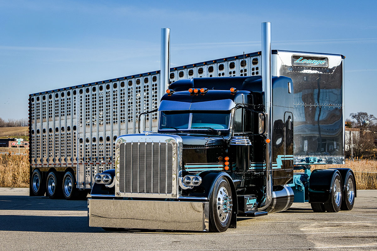 Black and Teal Peterbilt with Livestock trailer