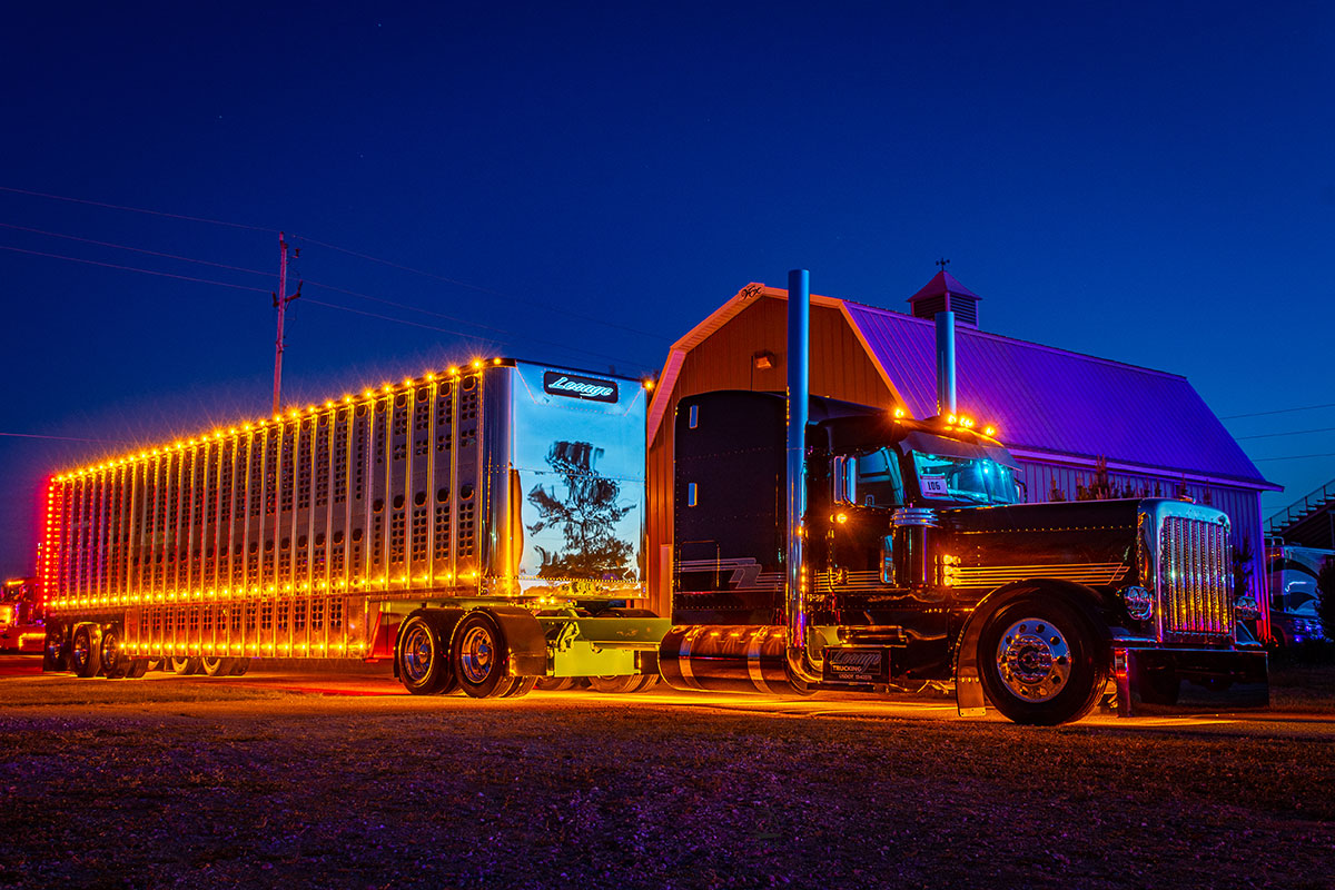 Custom 389 Peterbilt truck and trailer lit up at night