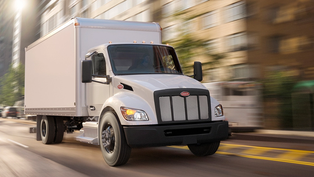 New Peterbilt 535 white delivery truck exterior view