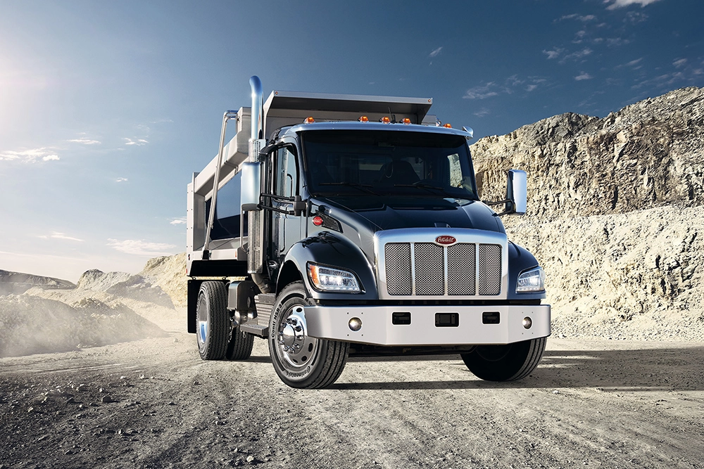 New Peterbilt 548 medium duty dump truck exterior view
