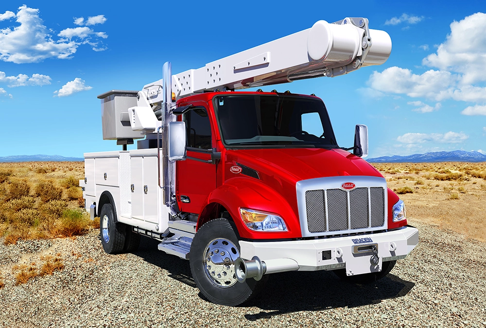 Used Peterbilt 537 red utility truck exterior view