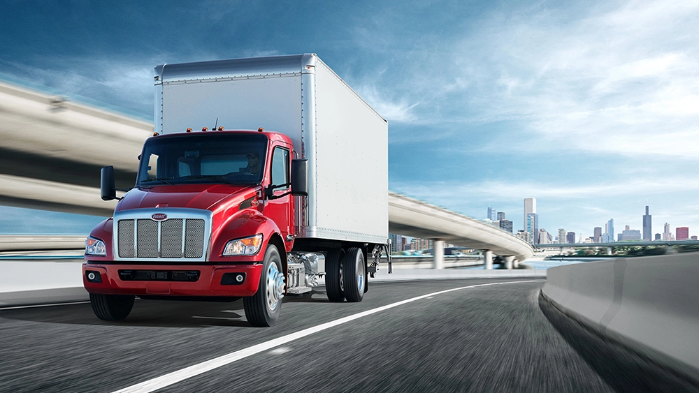 Used Peterbilt 536 red box delivery truck exterior view