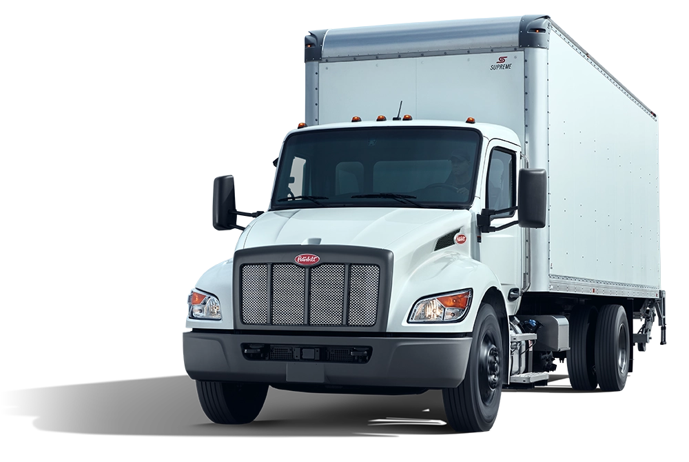 New Peterbilt 535 white box truck in city motion