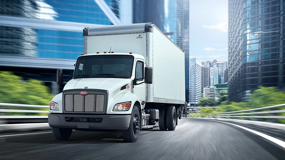 New Peterbilt 535 white box truck exterior view